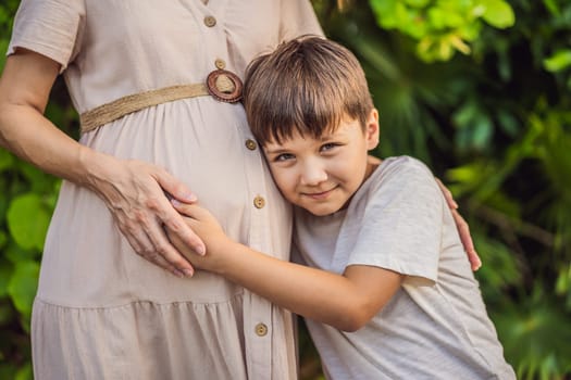 A heartwarming moment captured in the park as a pregnant woman after 40 shares a special bond with her teenage son, embracing the beauty of mother-daughter connection.