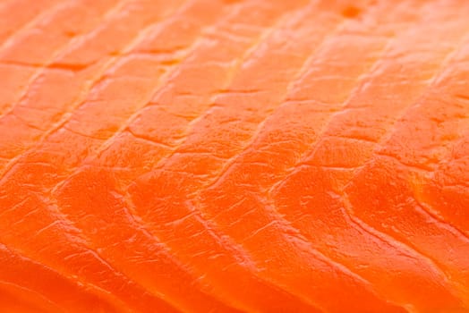 Salmon fillet background. A background of fresh smoked salmon.