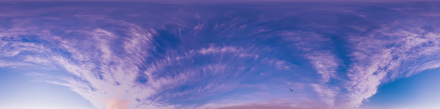 Bright sunset sky panorama with Cirrus clouds. Seamless hdr spherical equirectangular 360 panorama. Sky dome or zenith for 3D visualization, game and sky replacement for aerial drone 360 panoramas.