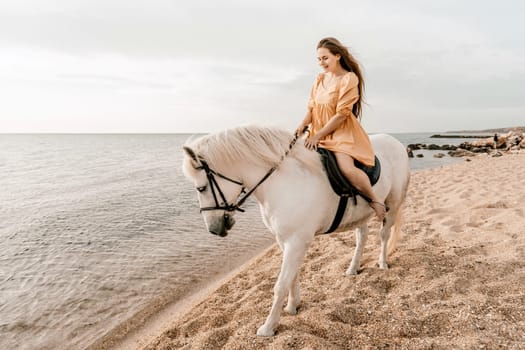 A white horse and a woman in a dress stand on a beach, with the sky and sea creating a picturesque backdrop for the scene