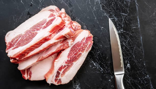 pork meat selection with knife isolated on white background