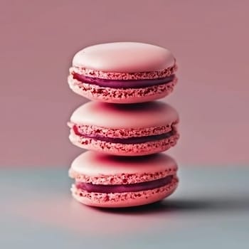 Sweet vanilla macarons on a stone background. Traditional French dessert