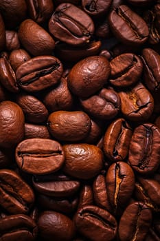 Texture of raw coffee beans close up. High quality photo