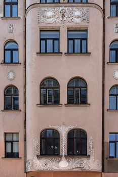 Riga, Latvia. August 2021.  view of the decorations on the facade of an old building in the city center