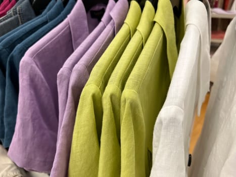 Linen women's jackets hang on a hanger at the store