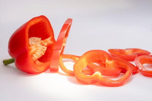 red bell pepper sliced on white background, red, cuisine, delicacy