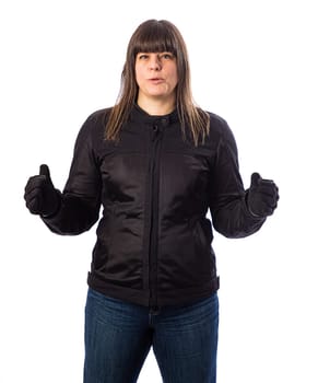 Forty year old woman, wearing motocycle clothing, giving thumbs up, isolated on a white background