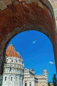 The famous Leaning Tower in Pisa, Italy with beautiful blue sky