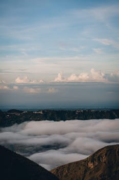 Landscape view of morning clouds and mist at mountain Batur. Sunrise trekking mount volcano Batur