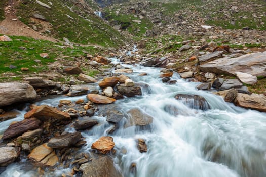 Waterfall in Himalayas in Koksar, Lahaul Valley, Himachal Pradesh, India