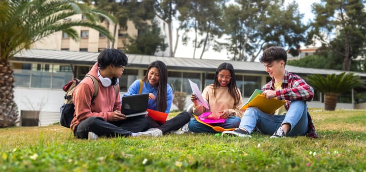 Banner of multiracial college students doing university research homework and study together sitting on campus grass using laptop. Higher education and technology concept.