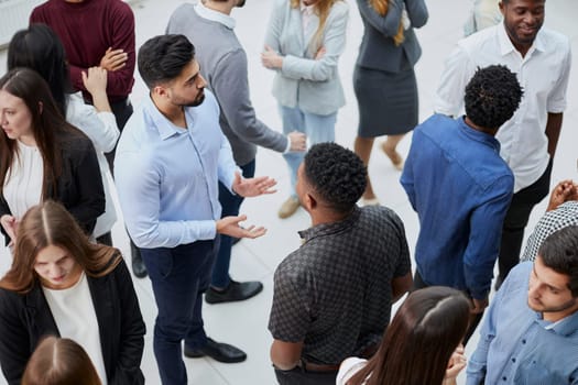 a group of successful young people communicate in a conference room