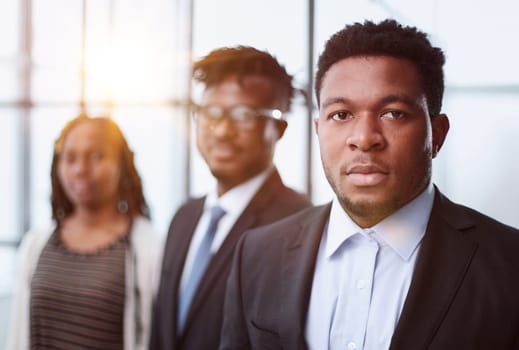 Diverse group of happy successful smiling coworkers wearing formal clothes