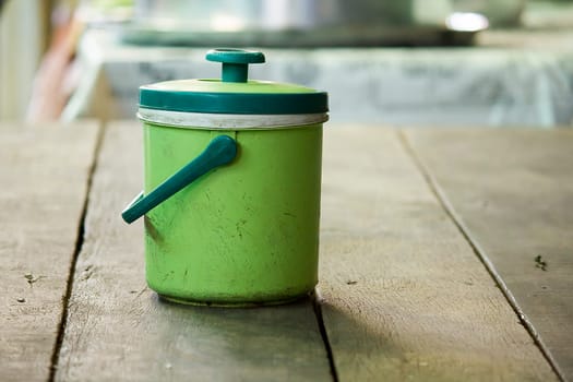 Ice Cooler Green plastic on the table