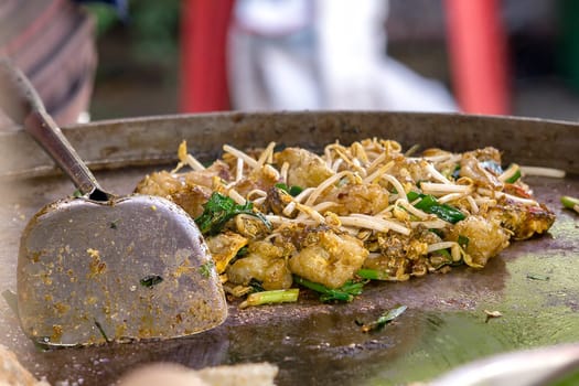 thai food Oyster omelette in the panIs a kind of Chinese food consisting of flour, eggs and shellfish