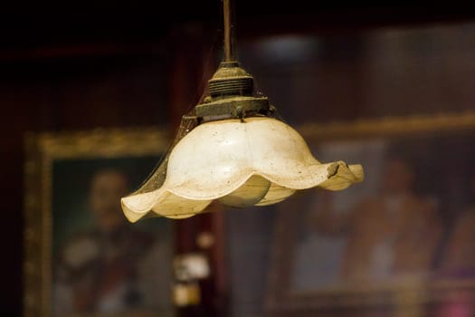 Old white lamps hung on top