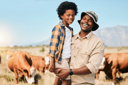 Happy black man, portrait and child with animals on farm for agriculture, sustainability or live stock cattle. African male person, dad and boy kid smile for natural farming or produce in countryside.