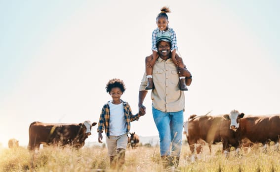 Family, father and children with animals on a farm outdoor for cattle, travel and holiday. Portrait of black man and kids walking on field with smile for adventure in countryside with cows in Africa.