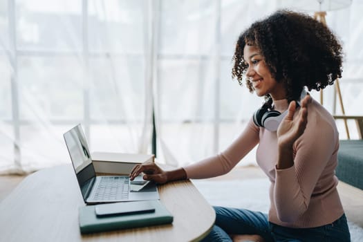 Video call or conference, african american university foreign exchange students study online on laptop pc english language class Exchange Program by international specialists with master at home.