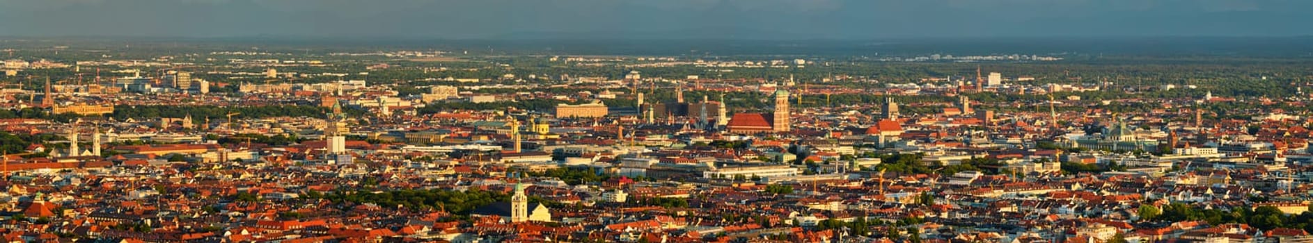 Aerial panorama of Munich center from Olympiaturm (Olympic Tower) on sunset. Munich, Bavaria, Germany