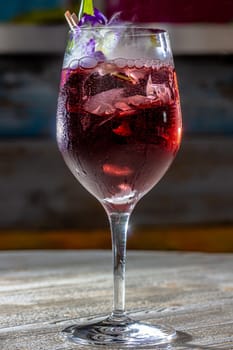 red cocktail with sparkling wine aperol whiskey juice bar.