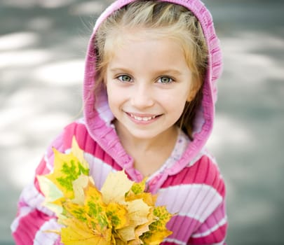 Cute little girl. Autumn portrait