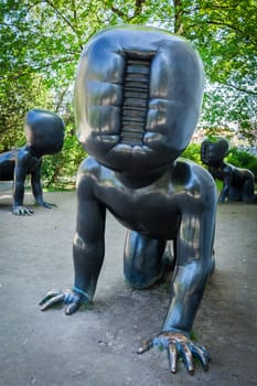 PRAGUE, CZECH REPUBLIC - APRIL 28, 2012: Bizarre crawling baby sculpture by David Cerny in Prague, Czech republic