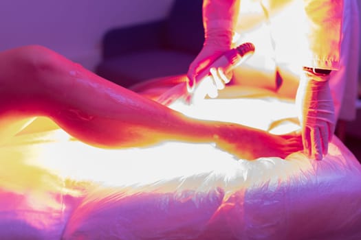 Laser hair removal and cosmetology. Cosmetic hair removal procedure. bright laser flash creative colorful shot.