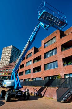 Rotterdam, Netherlands - May 14, 2017:Telescopic boom lift by Gunco in the street of Rotterdam