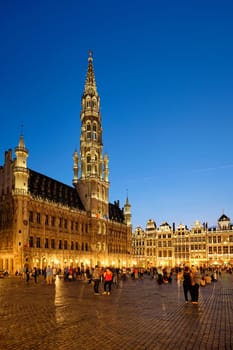 Brussels, Belgium - May 31, 2018: Grote Markt (Grand Place) square crowded with tourists illuminated at night. Bruxelles, Belgium