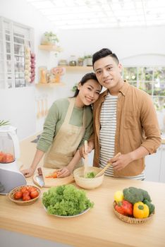  Young asian man and woman have romantic time while staying at home.