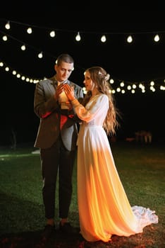 transfer of wedding fire with the help of candles from mothers to the newlyweds