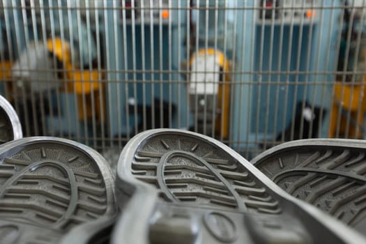 Image of rubber soles in workshop, close-up