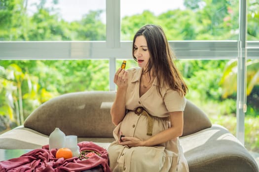 A serene moment captured as a pregnant woman after 40 embraces the soothing benefits of aroma oils and an aroma diffuser, enhancing her pregnancy journey with relaxation and tranquility.