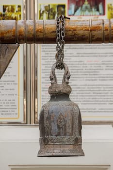 Big brass bells are commonly hung in Thai temples.