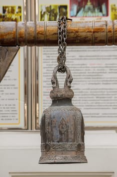 Big brass bells are commonly hung in Thai temples.