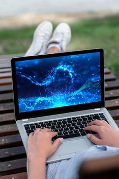 Laptop Resting On Lap Of Woman With Cross Leg Accomplishing Remote Job.