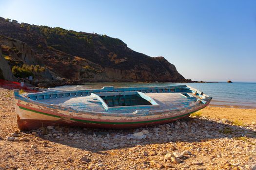 A Broken migrant boat stranded on the beach of the Agrigento coast