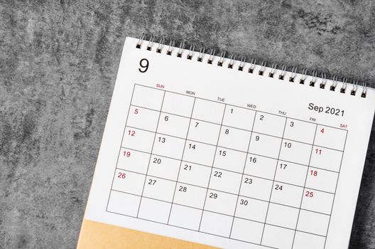 September 2021 Desk calendar on the table.
