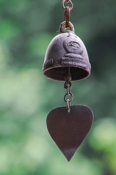 Small brass bells are commonly hung in Thai temples.