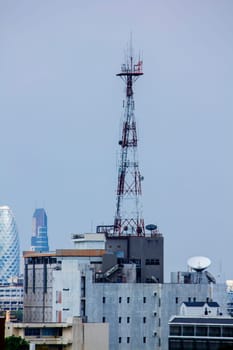 Antennas on buildings in Bangkok, Thailand.
