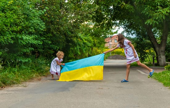 Children Ukrainians in vyshyvanka are patriots. Selective focus. victory,
