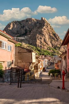 Traditional Afyonkarahisar houses and Afyon Castle in Afyonkarahisar Turkey