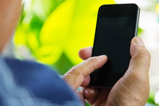 close up of man using smartphone