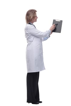 Female doctor smiling and showing a clipboard with an empty document. Concept of results and information of treatment