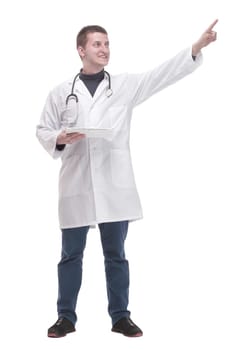 in full growth. modern doctor with a digital tablet. isolated on a white background.