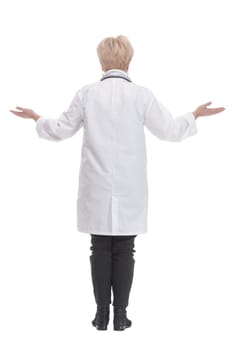 in full growth. competent doctor in a white coat. isolated on a white background.