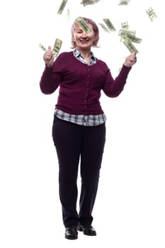in full growth. an adult woman looking at banknotes in her hands. isolated on a white