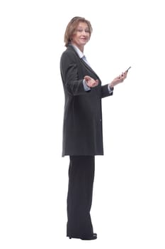Side view of happy mature woman using smartphone typing text message white background