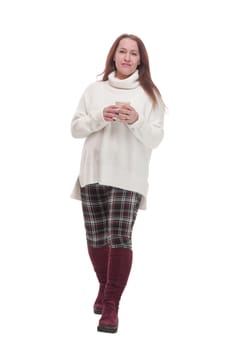 in full growth. casual attractive woman with takeaway coffee.isolated on a white background.